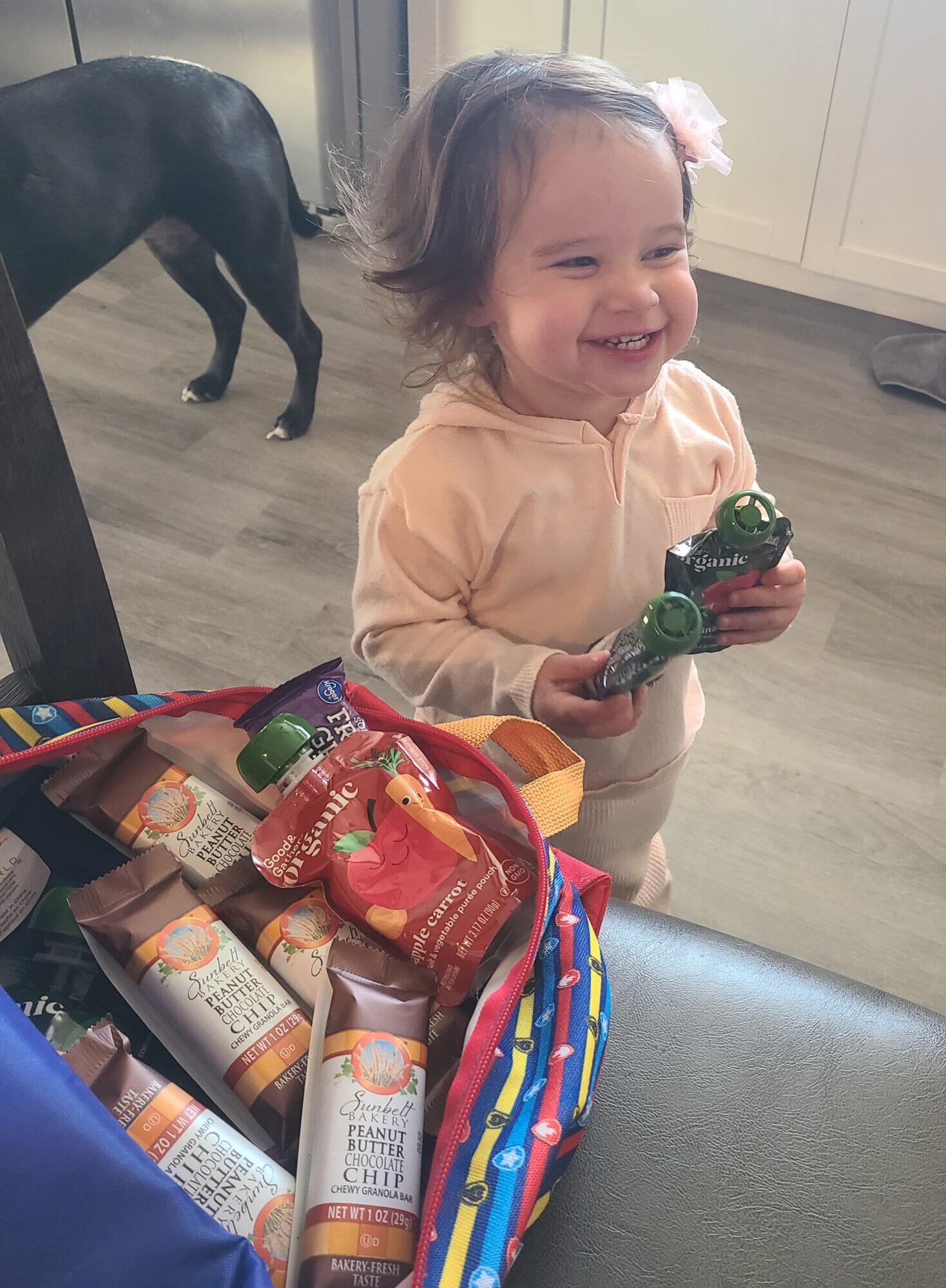 Happy Toddler with Snacks